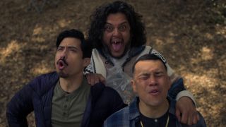 Chris Santos, Felipe Esparza, and J.J. Soria making noise in the woods in Gentefied.