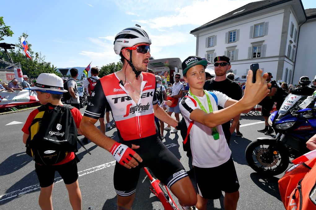 John Degenkolb poses for a photo with a fan after stage 5 at Tour de Suisse