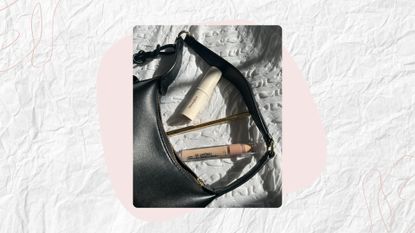 Image of three makeup products outside a black bag, on a white textured background with pink details