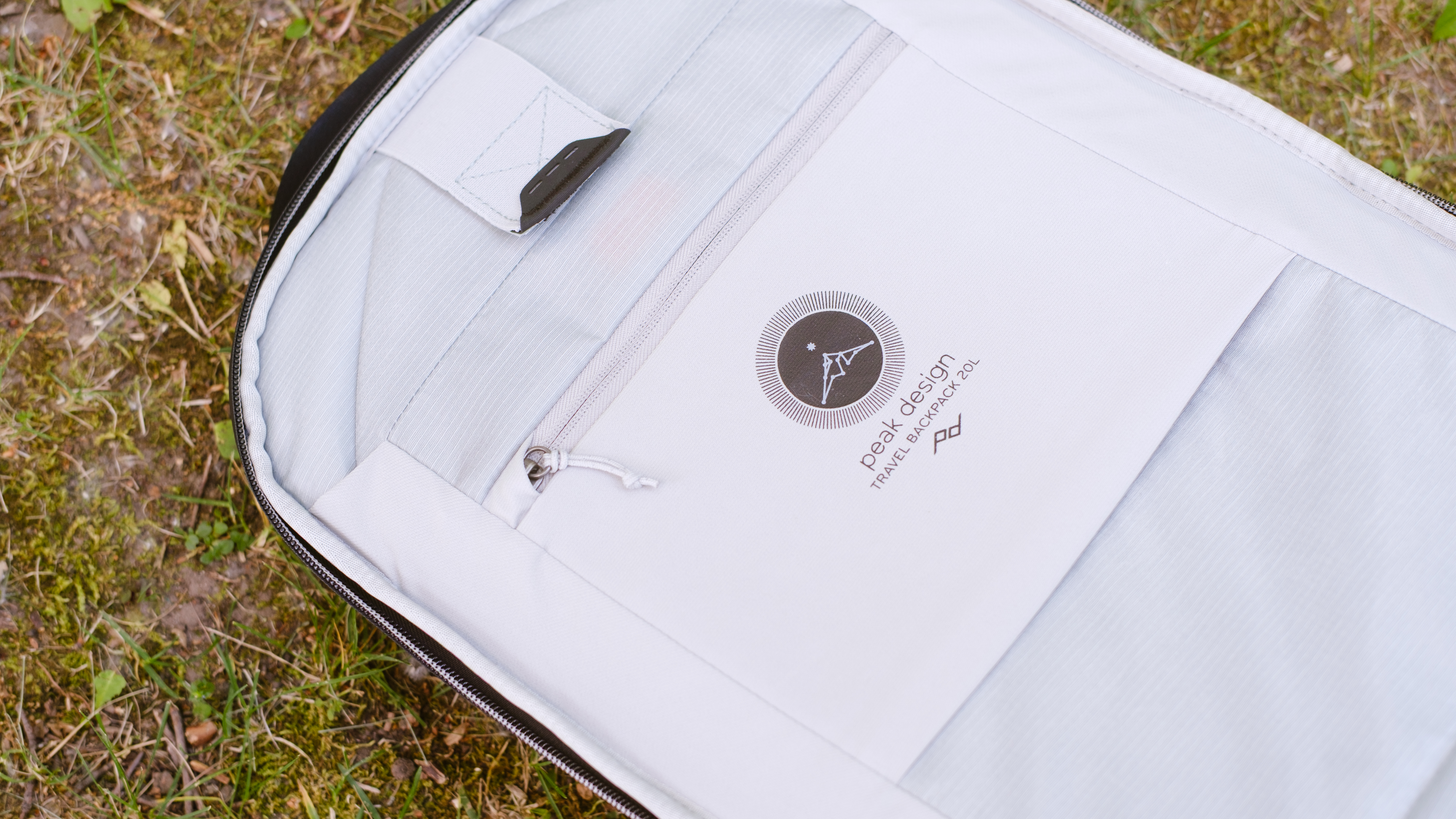 The Peak Design Travel Backpack 20L in use by a photographer