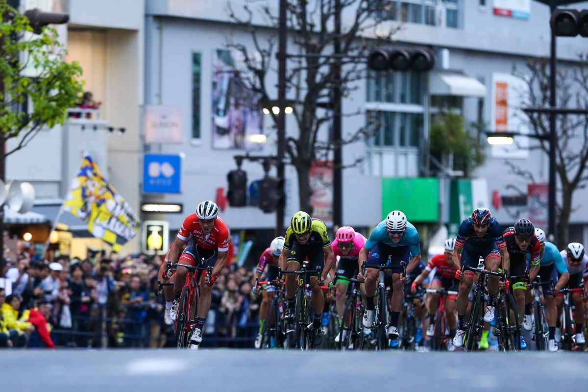 The sprint starts as the riders crest the hill