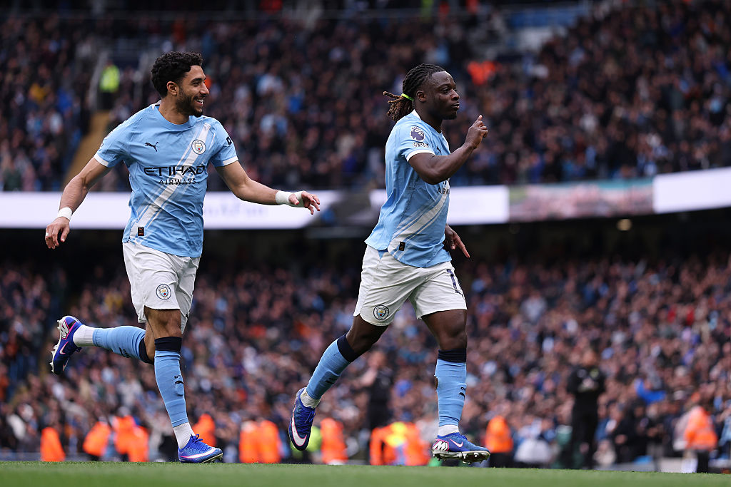 Jeremy Doku of Manchester City celebrates scoring his team's first goal during the Premier League match between Manchester City and Brentford