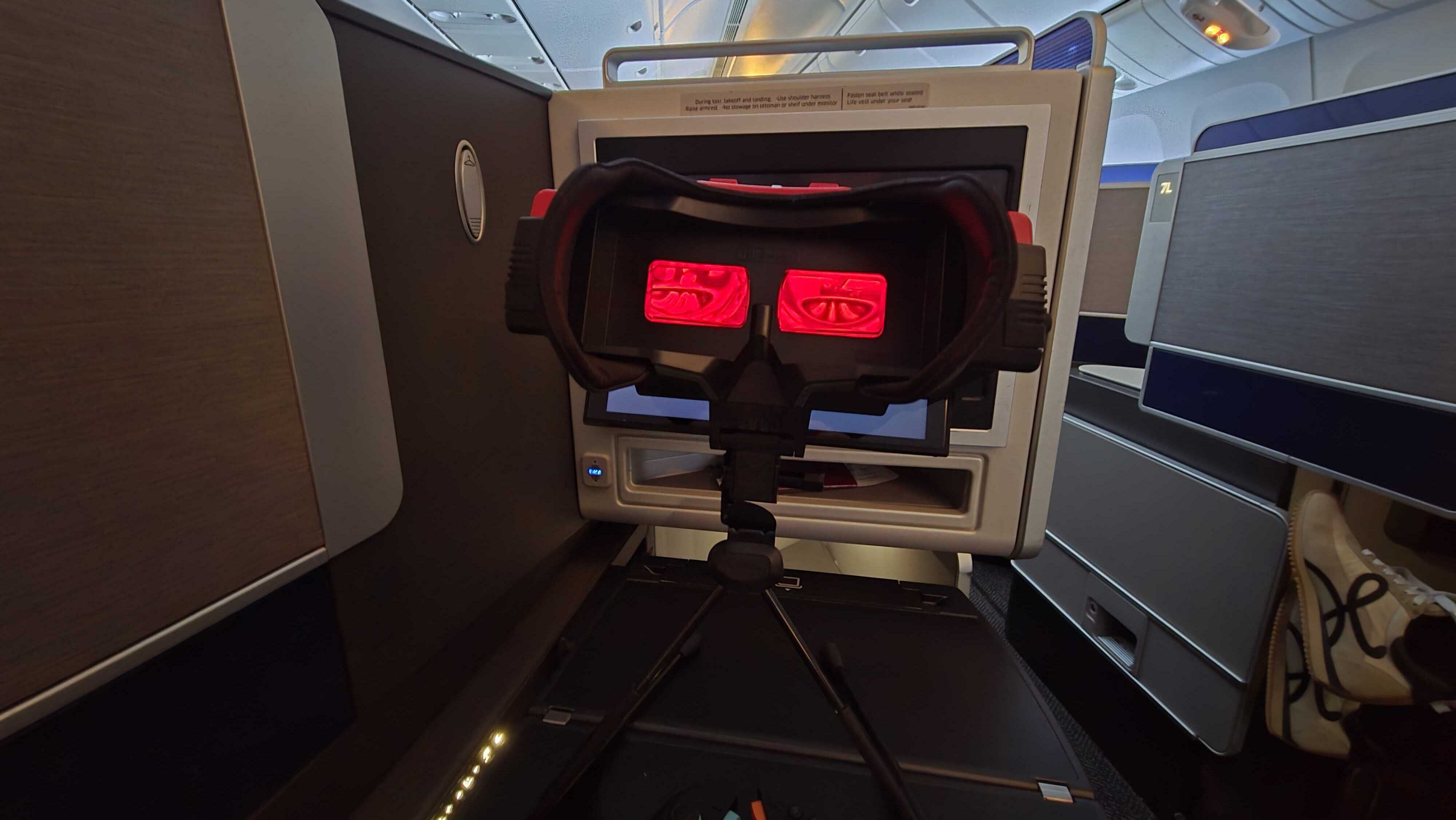 The Virtual Boy on a tray table on a United flight
