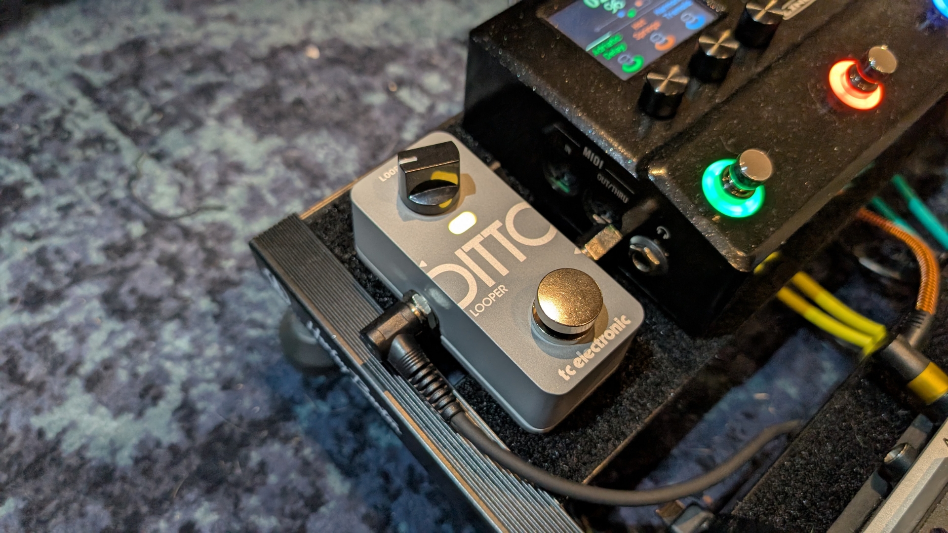 The TC Electronic Ditto 2 looper pedal on the end of a pedalboard