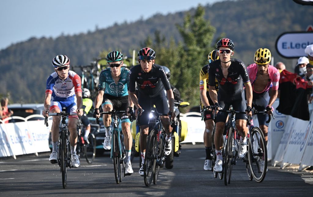 Team Ineos rider Colombias Egan Bernal C crosses the finish line at the Grand Colombier pass during the 15th stage of the 107th edition of the Tour de France cycling race 175 km between Lyon and Grand Colombier on September 13 2020 Photo by AnneChristine POUJOULAT various sources AFP Photo by ANNECHRISTINE POUJOULATAFP via Getty Images