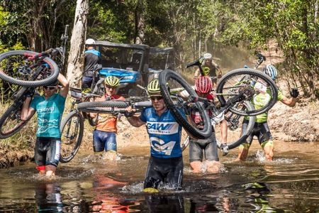 Eventual stage winner Bart Classens leads the way across a river crossing on stage 7 of the 2019 Crocodile Trophy
