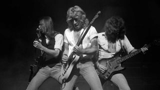 Status Quo live onstage in 1977