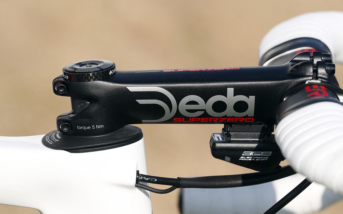 The Colnago is paired with an alloy Deda Super Zero stem and cockpit