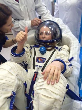 Soyuz TMA-18M spaceflight participant Sarah Brightman trains in a Russian Sokol pressure suit.