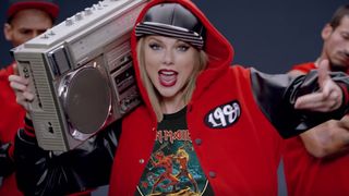  Taylor Swift in a still from her Shake it Off video with an added Iron Maiden t-shirt