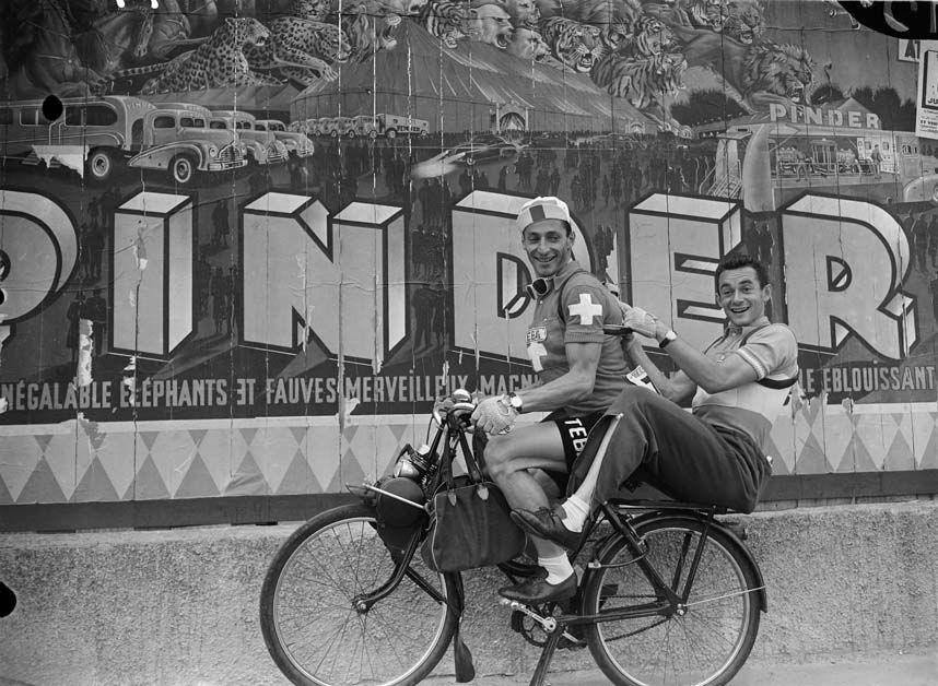Roger Hassenforder and Ferdi Kubler joke around before stage 2 of the 1955 Tour de France