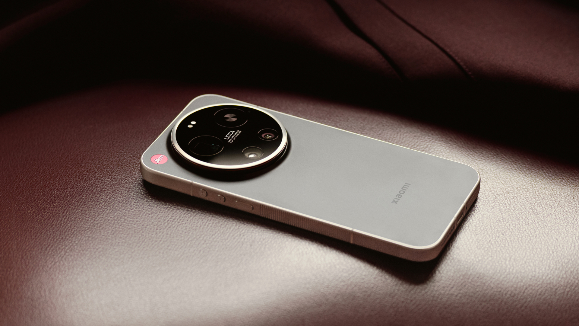 Leica Leitzphone smartphone on a leather sofa