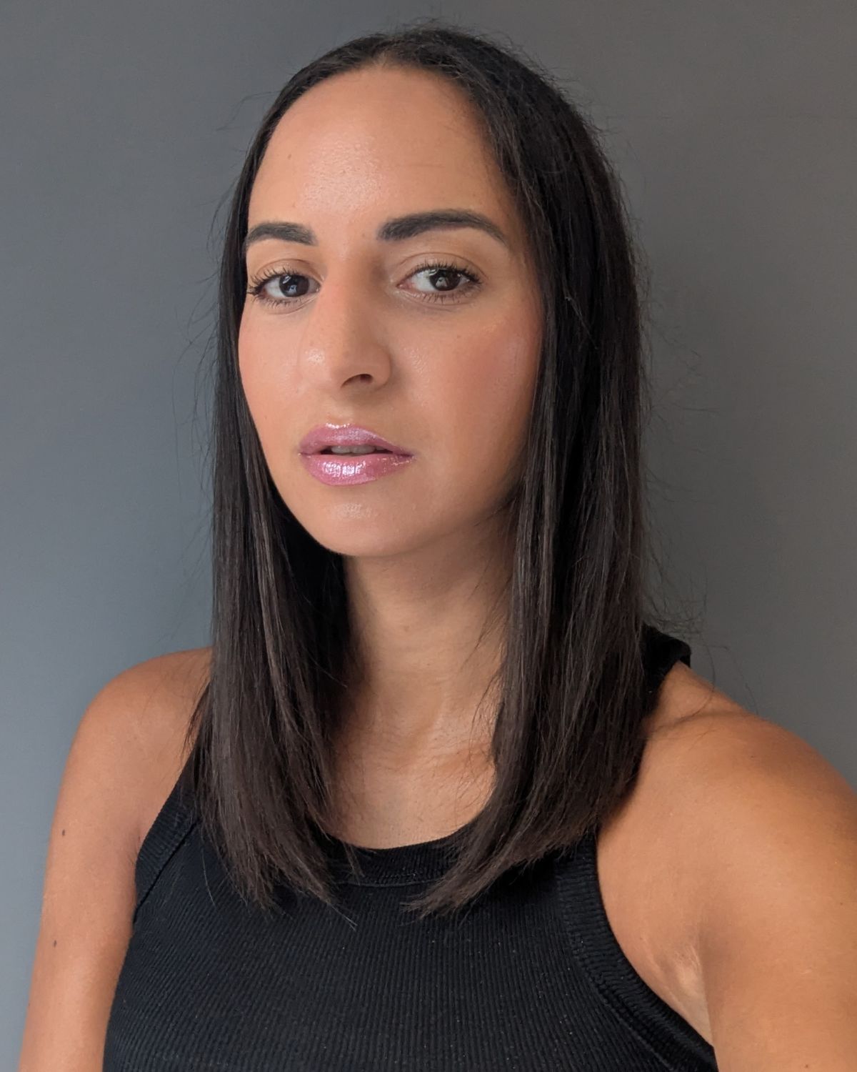 Best Pink Lipsticks @jazzriaharris wearing Fenty Beauty Glossbomb Stix Shimmer in Flamingo Pink