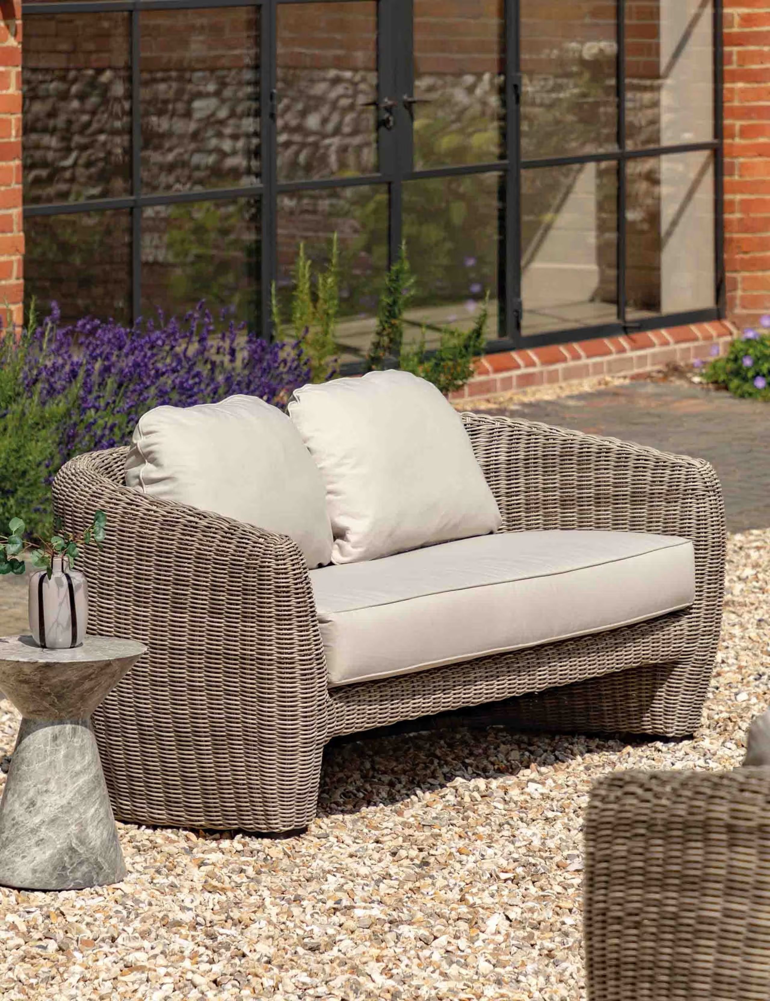 This Chubby, Chunky Outdoor Sofa Is a More Modern Take on Classic Wicker Garden Furniture