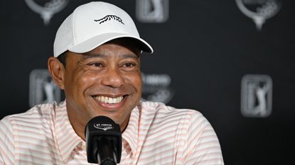 Tiger Woods speaks at a press conference