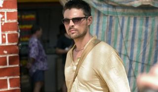 The Bourne Supremacy Karl Urban walking through a street market incognito