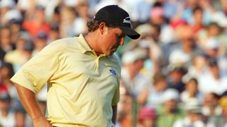 Phil Mickelson reacts after missing the chance of a playoff at the US Open in 2006