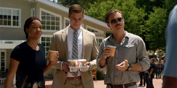 Bowman offering soup to Riggs on Lethal Weapon