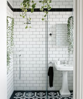 White subway tiles in bathroom with pedestal basin
