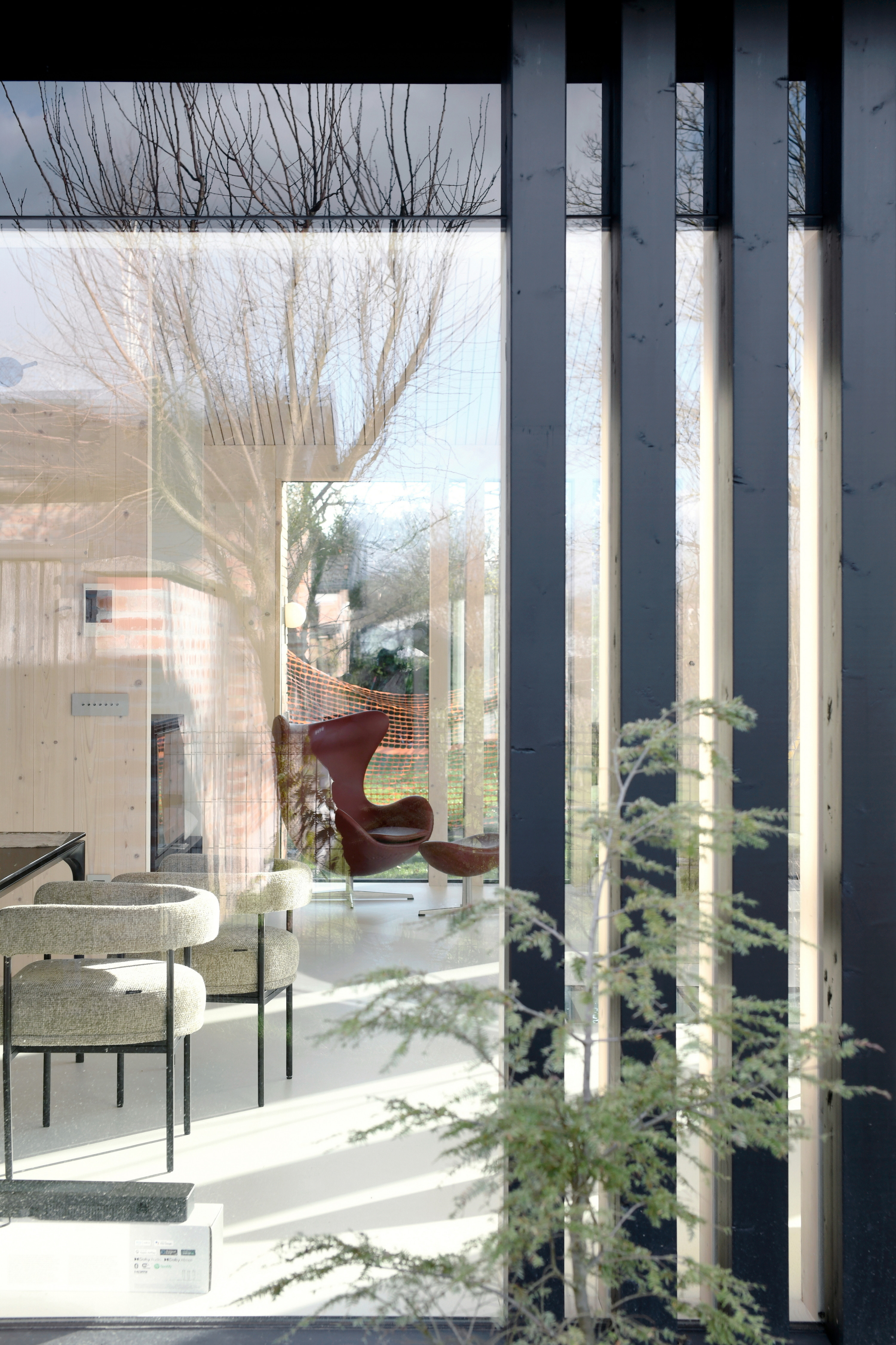 Vertical slats provide privacy to the main living space