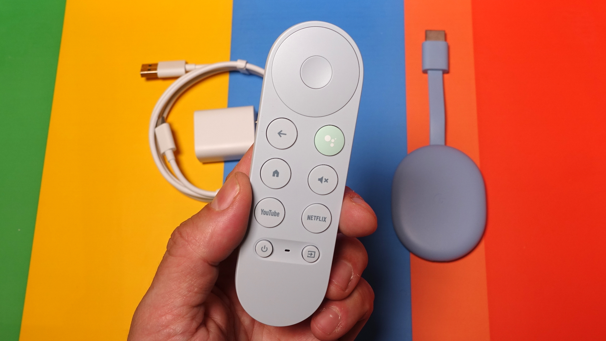 Chromecast with Google TV 4K remote in hand