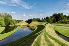 The Snake Mound and the Snail Mound at The Garden of Cosmic Speculation, Dumfries, Scotland, created by Charles Jencks and Maggie Keswick.