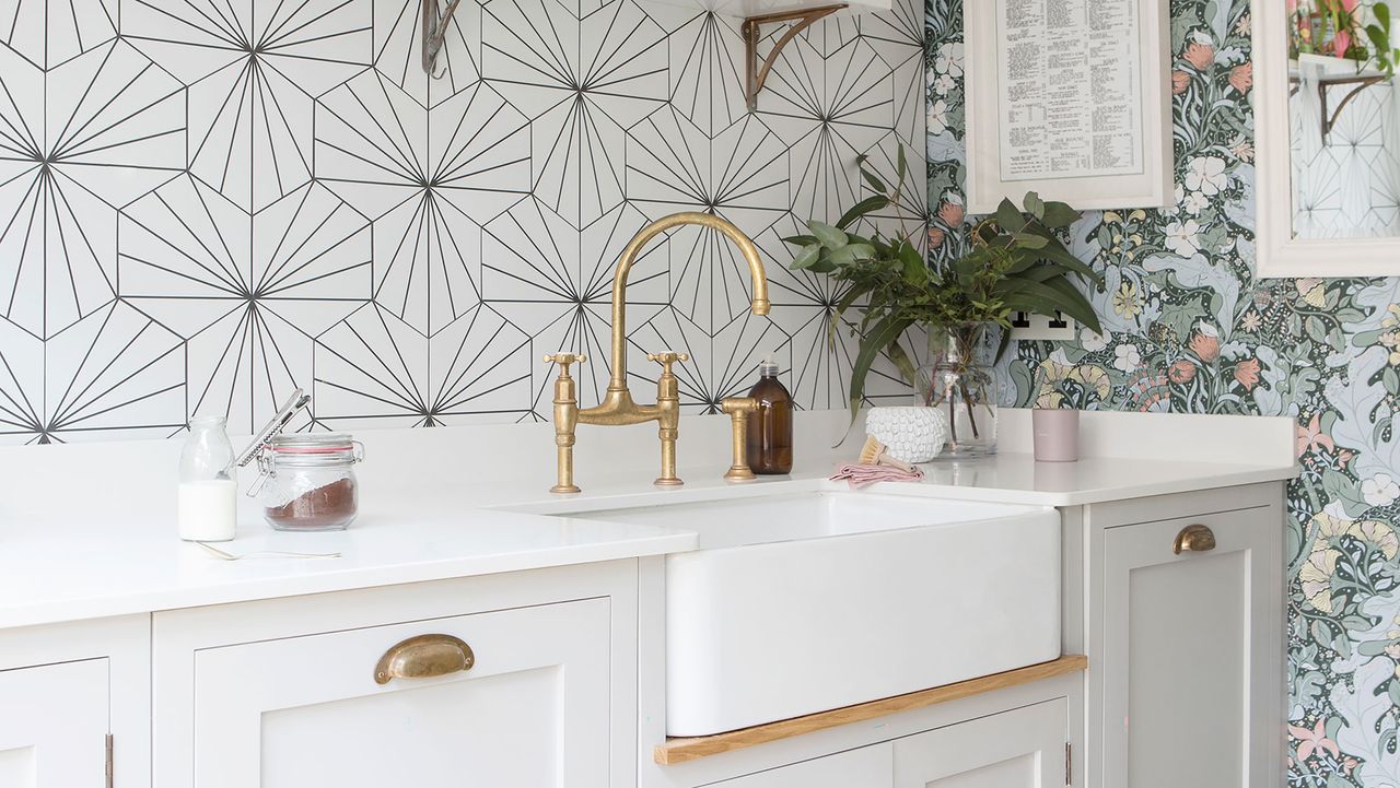 Kitchen with abstract black and white wallpaper and floral wallpaper