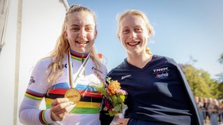Picture by Alex Whitehead/SWpix.com - Cycling - 25/09/2021 - UCI 2021 Road World Championships - Leuven, Flanders, Belgium - Zoe Backstedt of Great Britain celebrates with sister Elynor after winning Gold in the Junior Women's Road race.