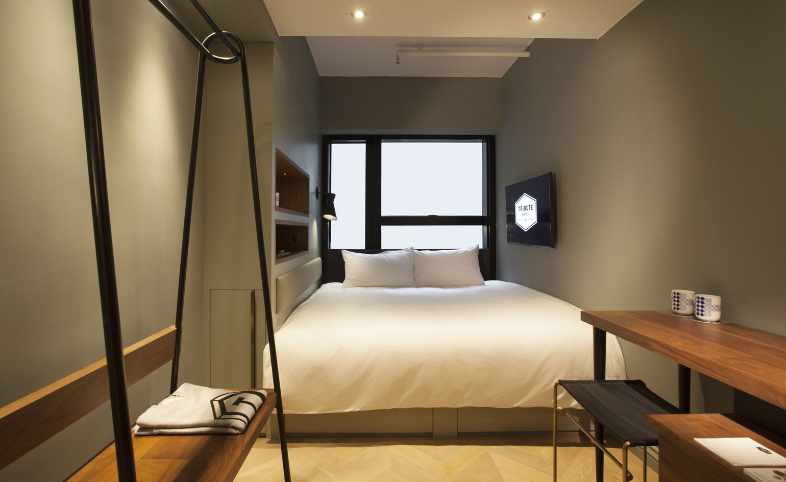 Bedroom with white bed and pillows
