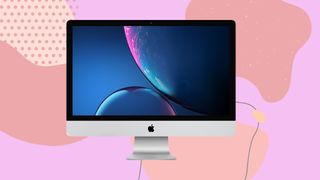 A 2020 iMac 27-inch against a pink abstract background