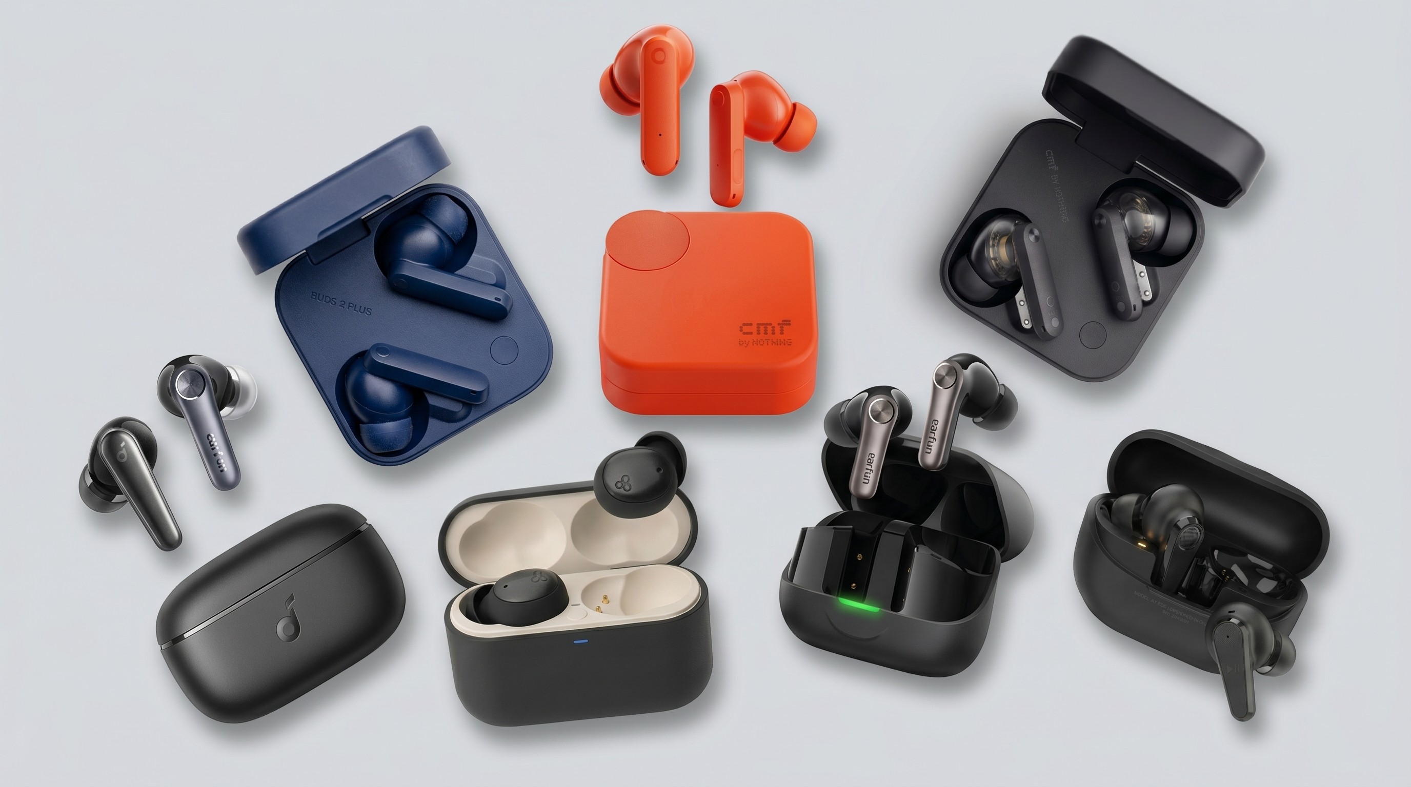 Earbuds from CMF by Nothing / EarFun / Soundcore by Anker / JLab / Final on a grey background