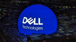 A photo of the Sphere in Las Vegas, bearing the Dell logo in white against a blue background to mark Dell Technologies World 2024. Decorative: The photo has been taken from above, with the city of Las Vegas surrounding the Sphere.