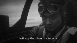 Ryunosuke Kamiki sits in a fighter jet with a determined look in Godzilla Minus One Minus Color.
