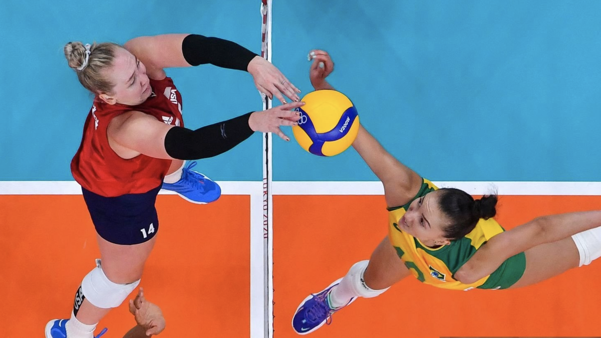 Brazil&#039;s Gabriela Braga Guimaraes hits the ball in front of USA&#039;s Michelle Bartsch-Hackley ahead of the volleyball live stream at Olympics 2024 