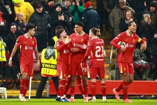 Liverpool, England - January 21: Harvey Elliott of FC Liverpool celebrates after scoring his team's second goal with teammates during the UEFA Champions League 2024/25 League Phase MD7 match between Liverpool FC and LOSC Lille at Anfield on January 21, 2025 in Liverpool, England. (Photo by Ryan Crockett/DeFodi Images via Getty Images)