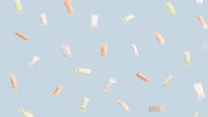 Various nicotine pouches on blue background