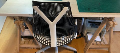 Herman Miller Sayl chair with a desk and cutting board