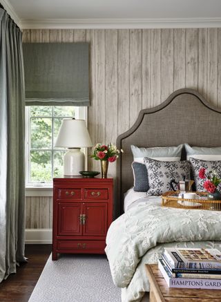 small bedroom with wood clad walls, curtains and Roman blinds by Joshua Smith