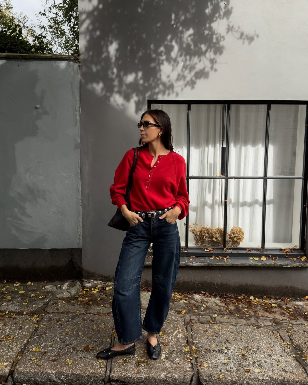 Jessica in red henley and horseshoe jeans