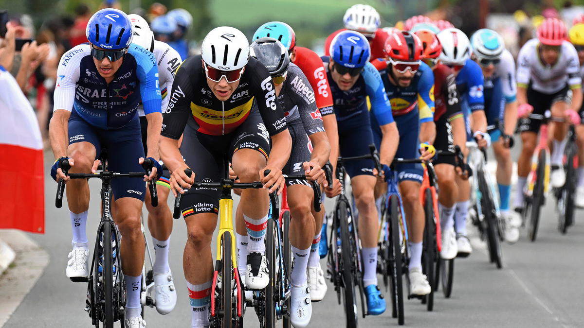 Israel-Premier Tech&#039;s Jakob Fuglsang and Lotto&#039;s Arnaud De Lie race alongside each other at the Tour de France