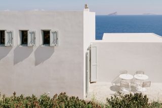 front facade of the white Kythnos Island house by architect Sigurd Larsen