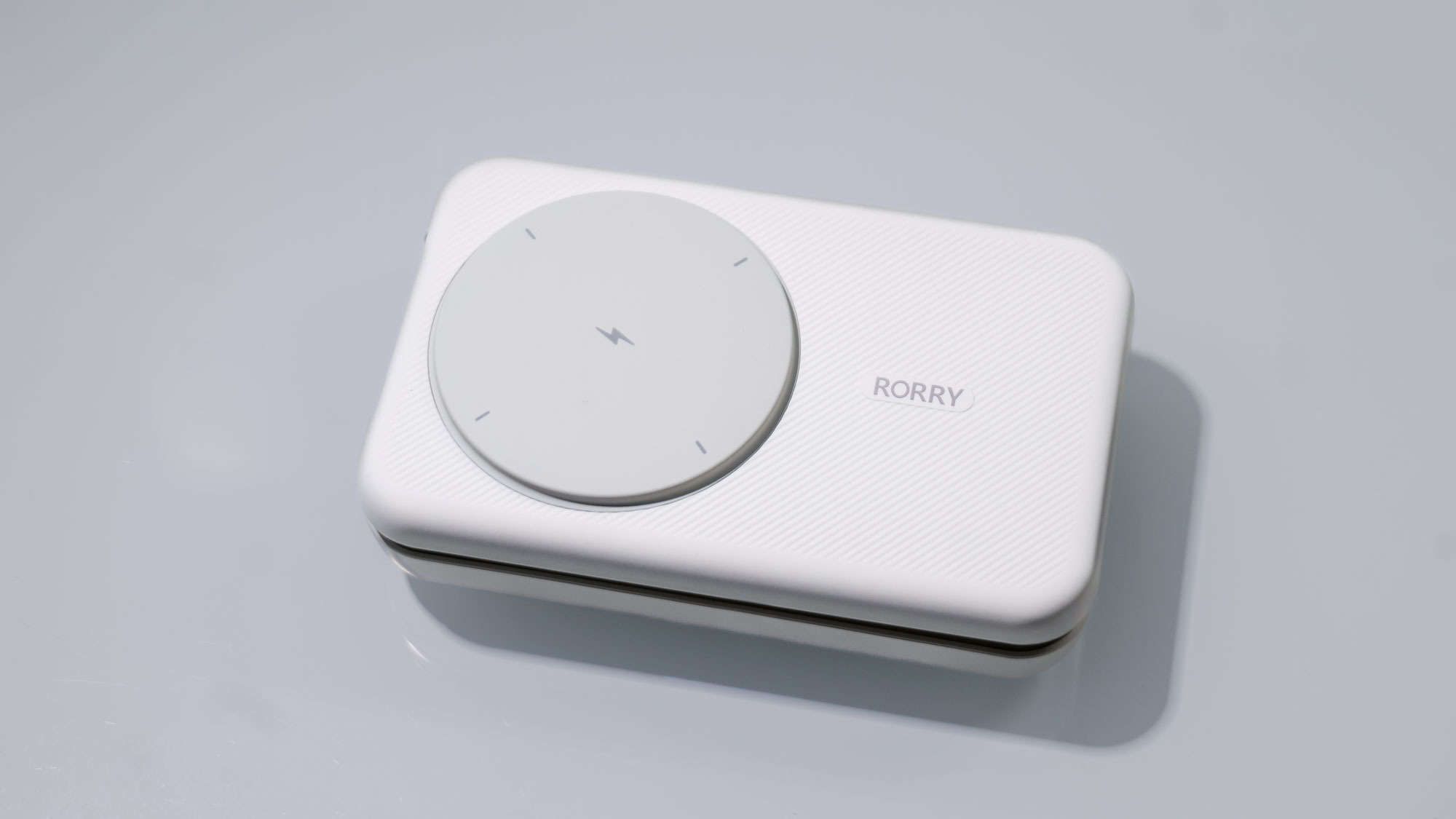 Rorry 3-in-1 Portable 10000 mAh Charger on desk.