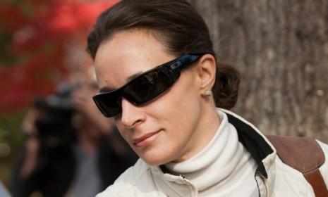 Paula Broadwell leaves her home in Charlotte, N.C., on Nov. 19: The New York Daily News reports that Broadwell's emails to Florida socialite Jill Kelley were more "menacing" than previously b