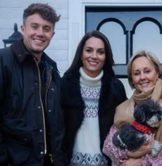 Kate Middleton posing with Martin and Roman Kemp and their family outside their house