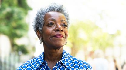 Older woman looking away and smiling