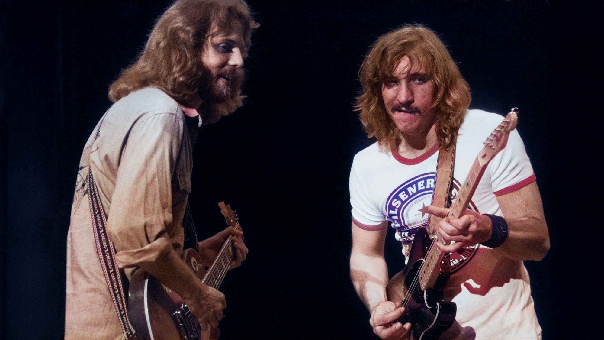 (L-R) Don Felder and Joe Walsh of The Eagles perform on stage at Ahoy on 11th May 1977 in Rotterdam, Netherlands.