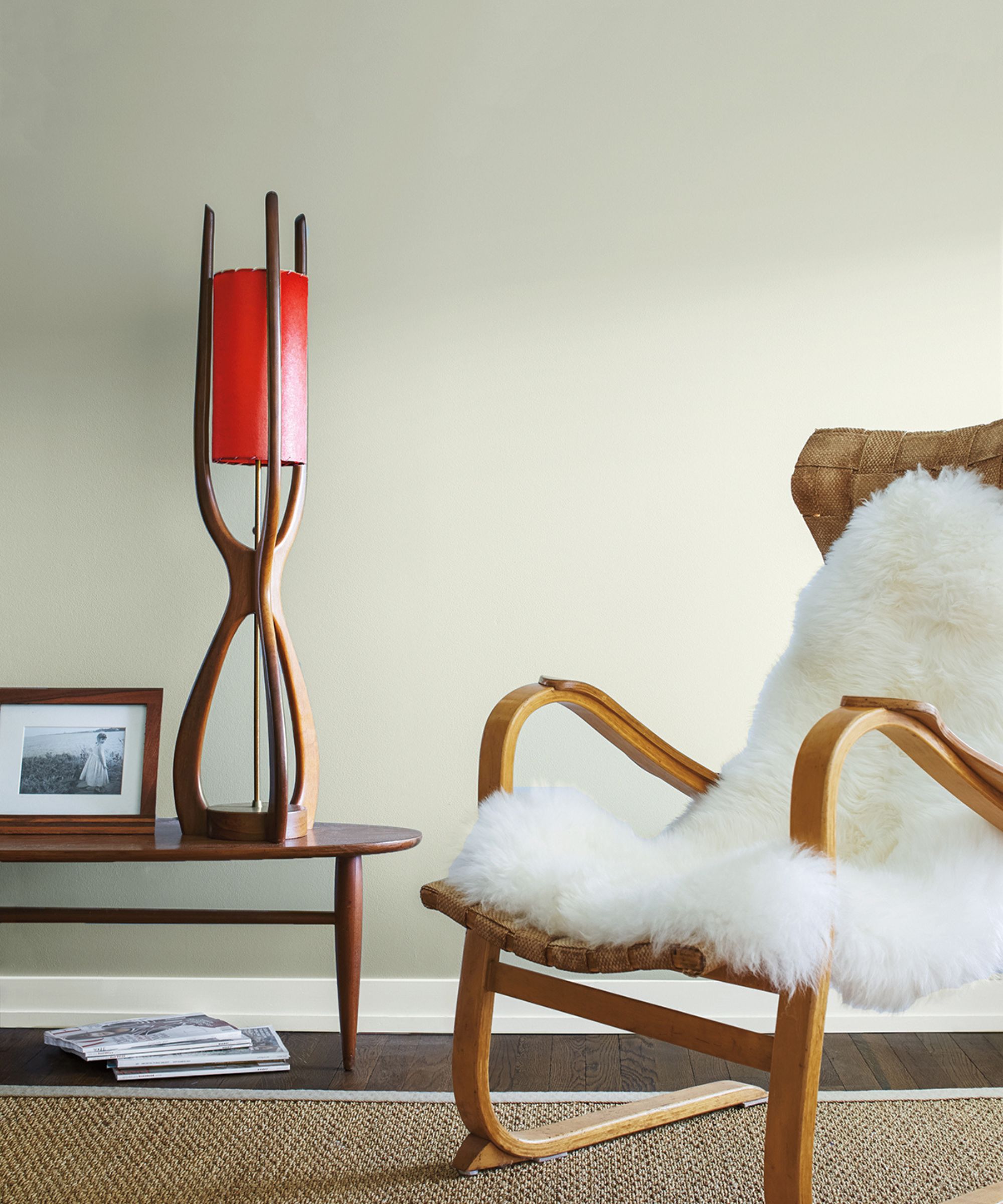 white living room with wood scandi armchair