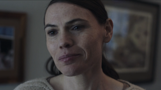 Clea DuVall smiling in The Handmaid's Tale