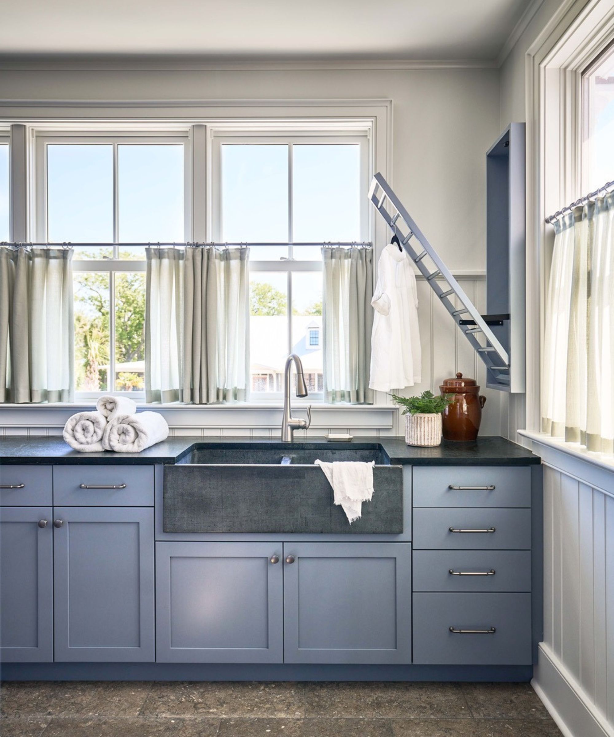 Herlong Interiors laundry room with a large soapstone sink