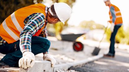 Construction workers building a road